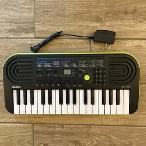 Casio SA-46 Mini Keyboard 32 Keys 100 Tones 50 Rhythms with AC Adapter